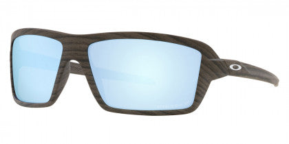 L159 OAKLEY CABLES 912906 63 WOODGRAIN / PRIZM DEEP WATER  POLARIZED